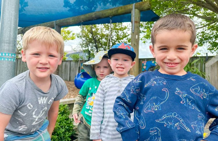 Evolve Education four Preschool boys playing in the playground at daycare