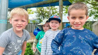 Evolve Education four Preschool boys playing in the playground at daycare